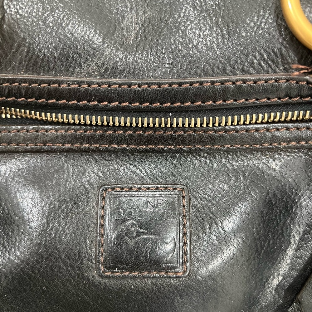 Beautiful Dooney & Bourke with Double Pockets.
Comes with crossbody strap. - Picture 6 of 9